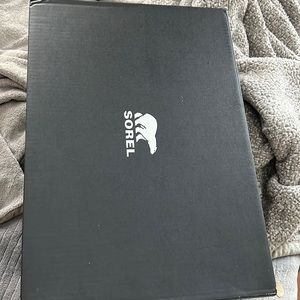 Sorel boots never worn, box , tags attached